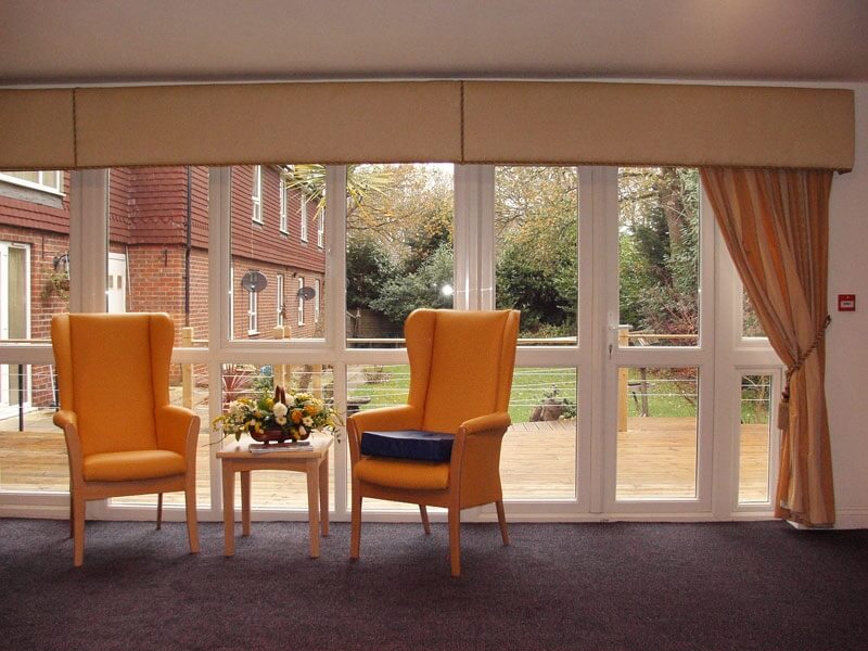 Garden views through the lounge windows at Marlborough House Care Home.